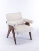 Accent chair, KD rubber wood legs with black finish. Fabric cover the seat. With a cushion.Cream